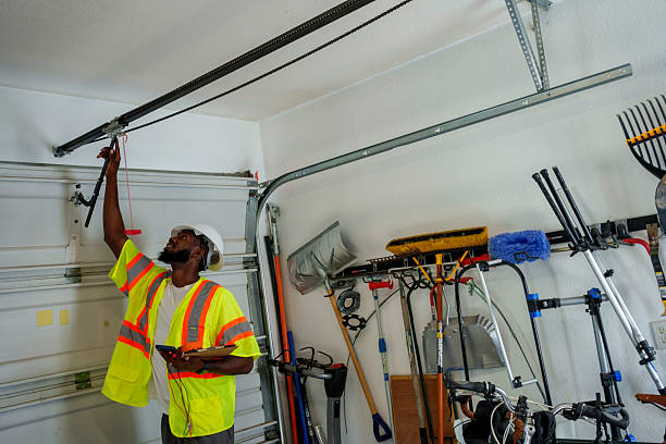 Professional Garage Door Installation technician working in West Wood, UT